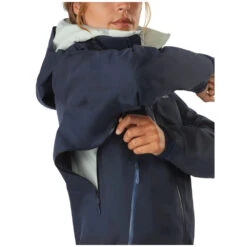 Arcteryx Beta AR Jacket Women -Edelrid Shop Arcteryx Beta AR Womens Waterproof Hooded Jacket Revised KingFisher Person Under arm 900x c77008f7 f891 4c00 915f af44095ed700